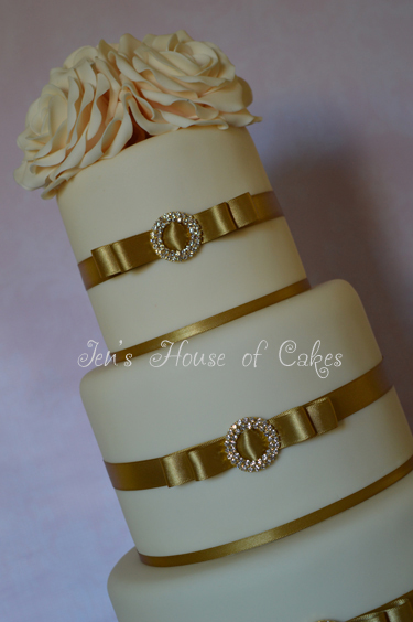Gold Buckles and Ivory Roses Wedding Cake