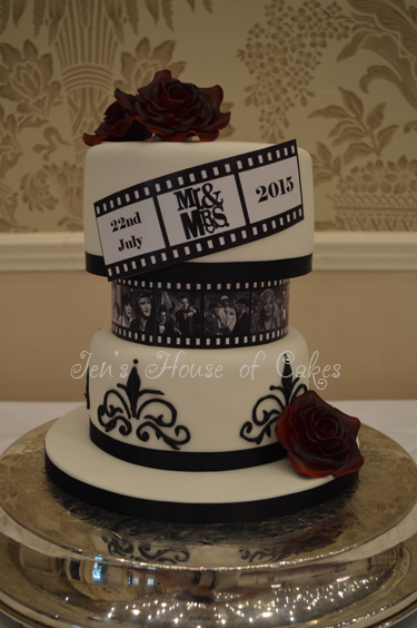 Hollywood Film Reel Cake with Burgundy Sugar Flowers