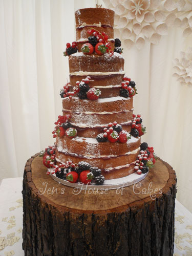 Naked Fruit Wedding Cake sitting on Tree Stump at Whinstone View