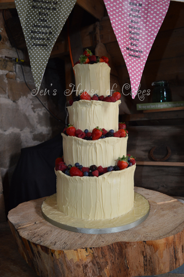 White Chocolate Wrapped Cake Trimmed with Summer Fruits